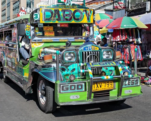 bigstock-Jeepney-On-Manila-Street-133664867_baja