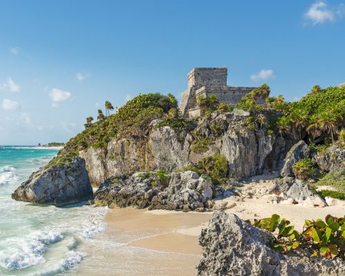 Tulum beach and maya temple ruins by Caribbean Sea, Yucatan, Mexico.